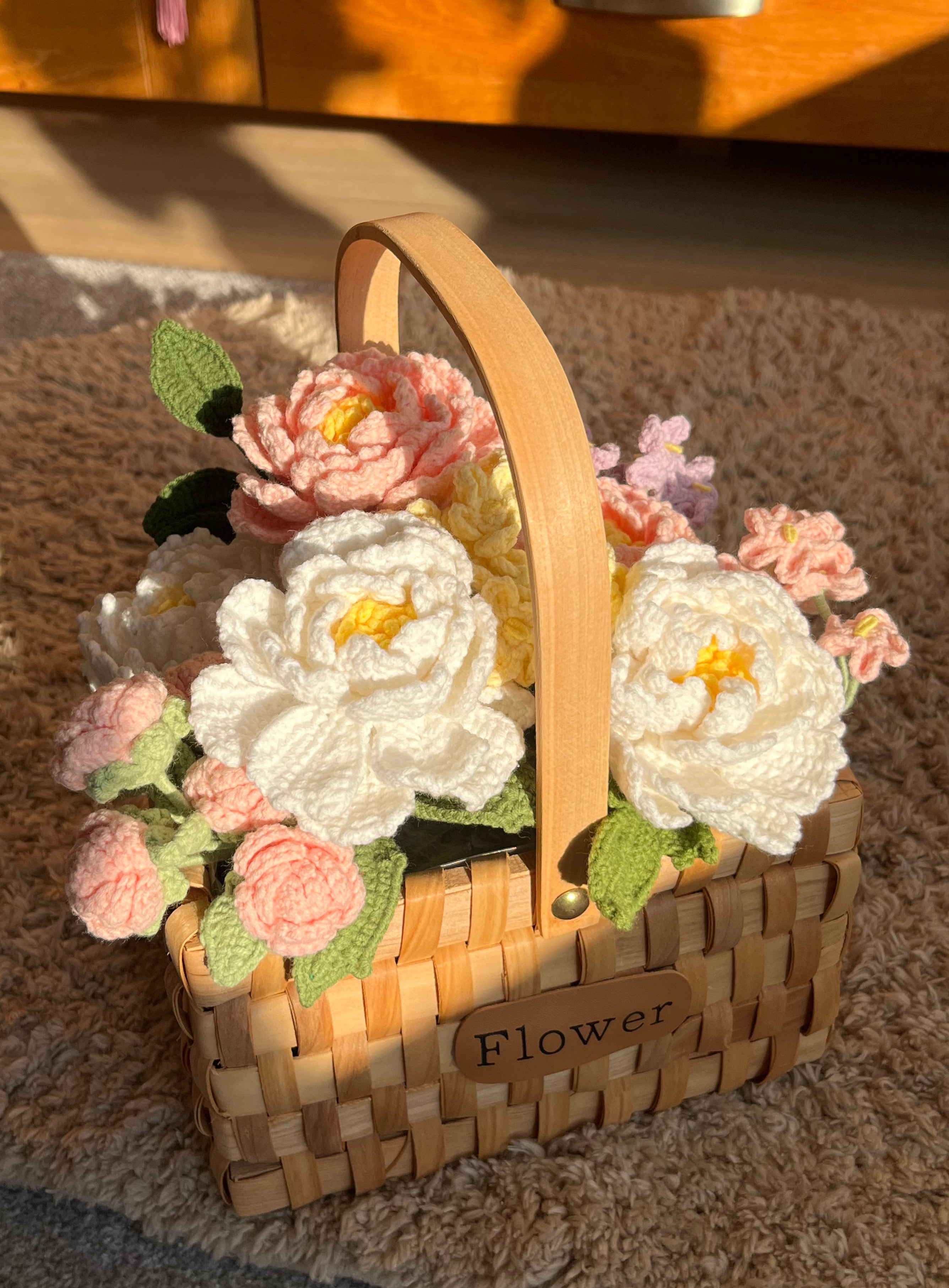 Handgehaakte bloemenmand – zacht & elegant