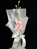 Handgehaakt roze bloemetje boeket – zacht & elegant